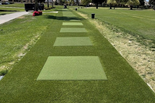 Huntsville Outdoor tee line with light green synthetic grass boxes inside a dark green synthetic grass strip